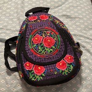 Purple cross body bag